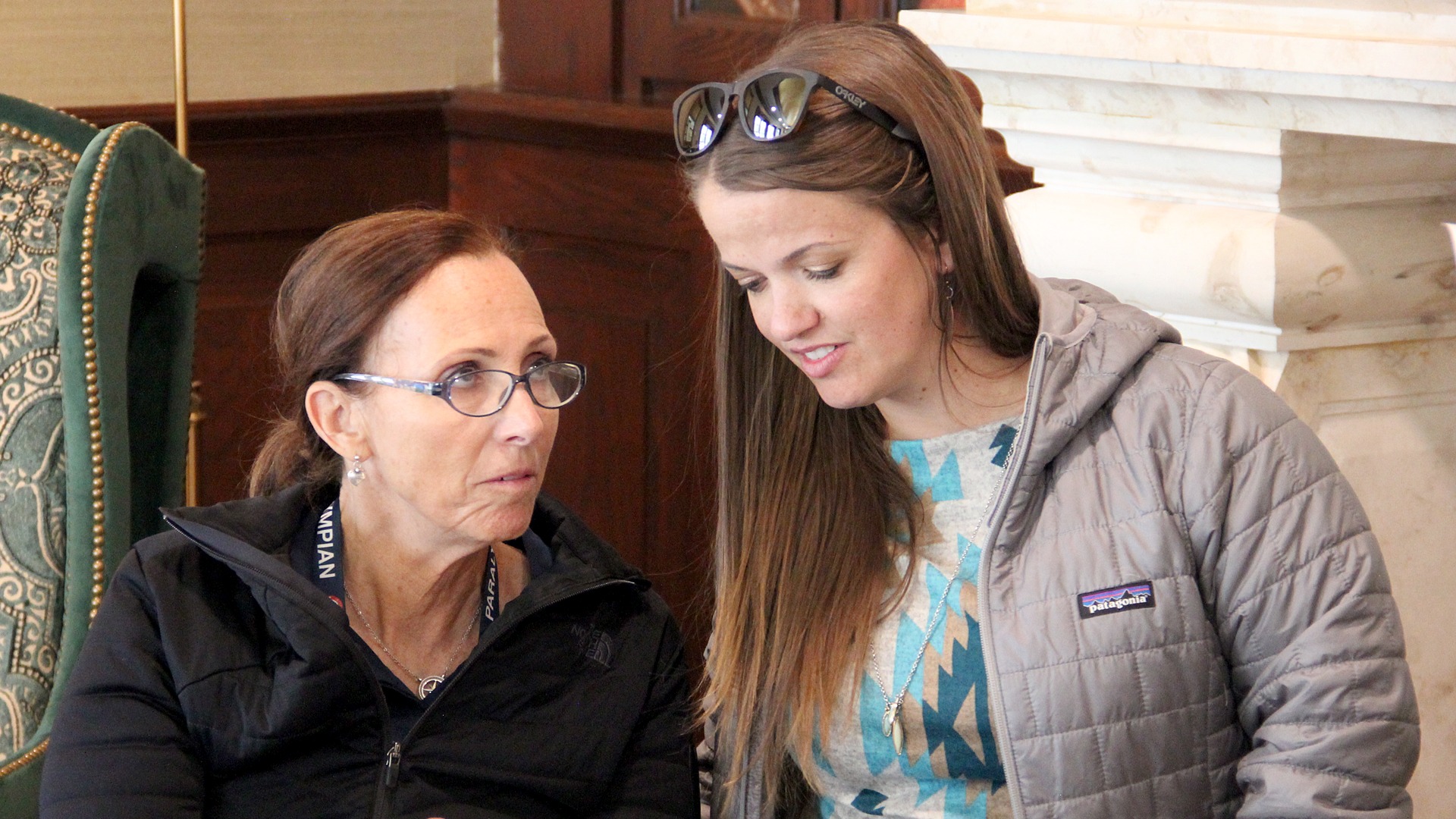 U.S. Olympic & Paralympic Hall of Fame Class of 2019 members Candace Cable and Erin Popovich review a list of potential conversation topics as they prepare for their StoryCorps conversation.