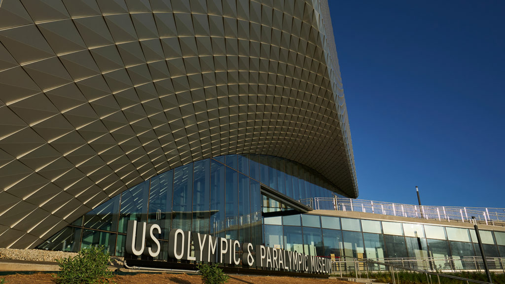 Exterior view of outside of the Museum with U.S. Olympic & Paralympic Museum sign.
