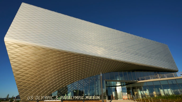 Exterior shot of the Museum with sunlight glistening off the diamond panels