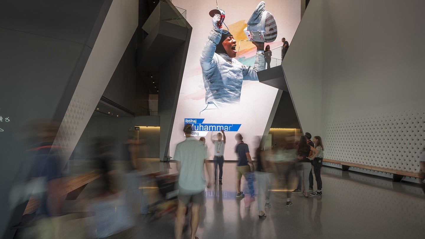 Guests enter the Museum atrium and see the 40-foot LED wall