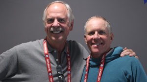 John Naber and Gary Hall Sr. smile for a photo.