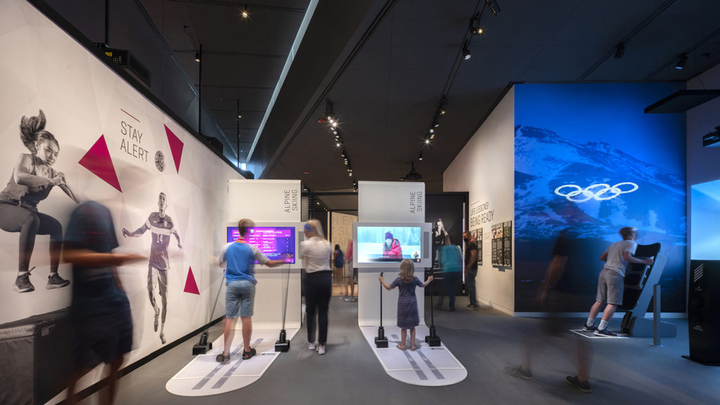 Guests participate in the Winter Games interactive exhibits.