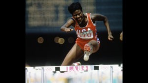 Benita Fitzgerald-Mosley is focused as she clears a hurdle in the 100-meter hurdles at Los Angeles 1984