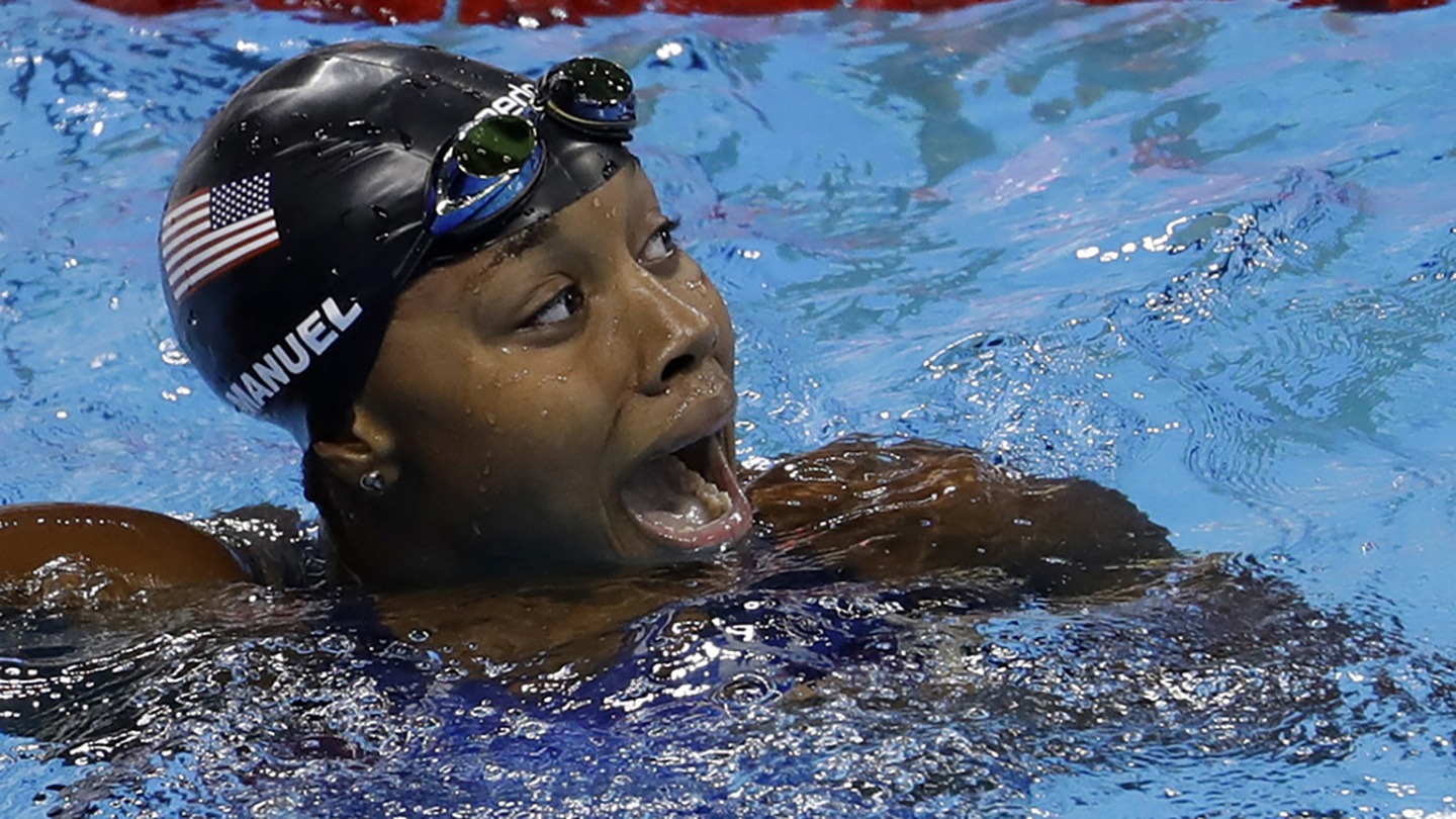 Simone Miles reacts jubilantly after realizing she has won Olympic gold