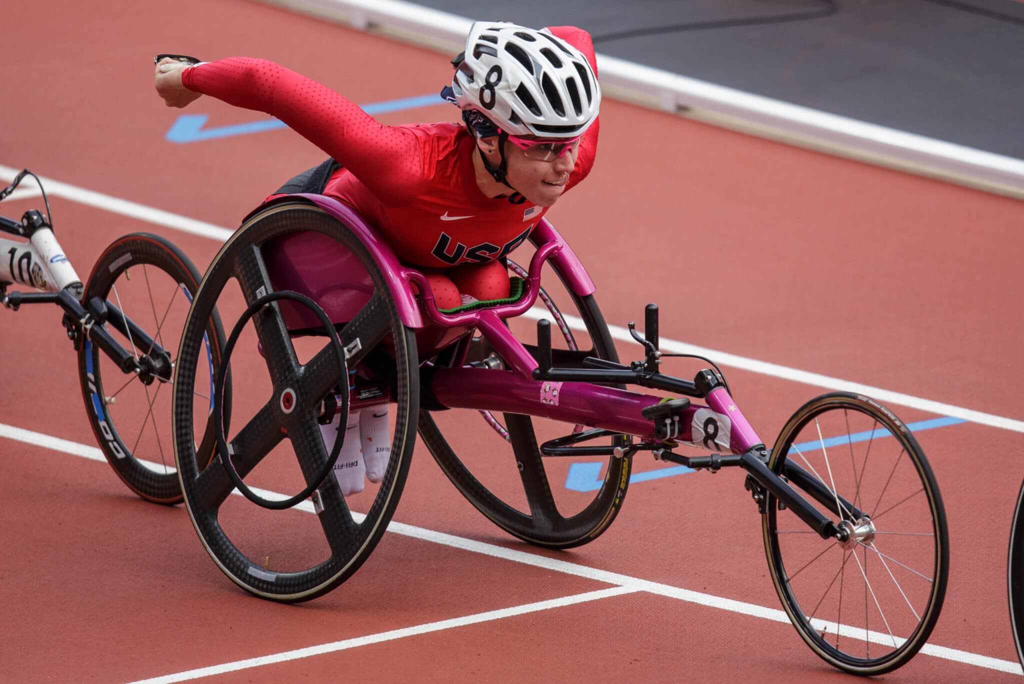 Amanda McGrory nears the finish line in her racing wheelchair