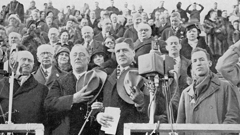 Franklin D. Roosevelt joins other dignitaries to open the Lake Placid Games