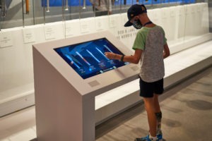 Young boy enjoys exhibit at USOPM.