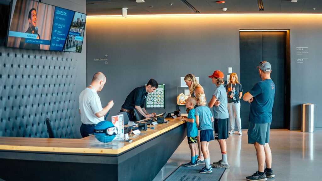 Family checking in at the U.S. Olympic & Paralympic Museum