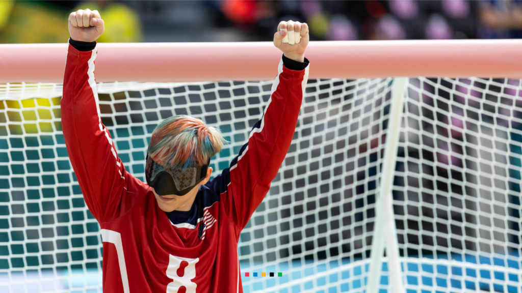 Picture of Christian King goalball athlete with their hands up