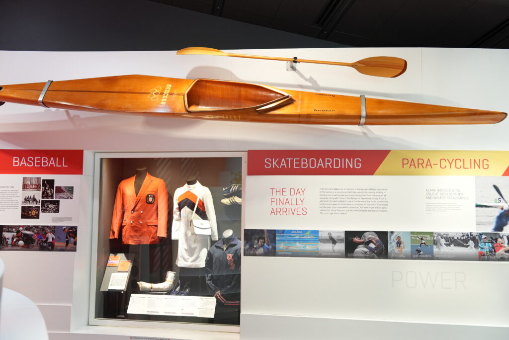 1968 Artifacts from the Mexico City Games featuring a kayak, program, uniforms and Dick Fosbury items