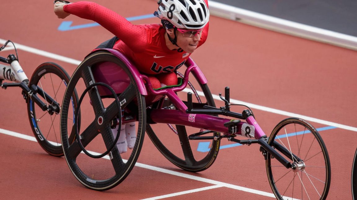 Amanda McGrory nears the finish line in her racing wheelchair